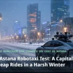 inDrive's Astana Robotaxi Test: A Capital-Light Bet on Cheap Rides in a Harsh Winter A driverless robotaxi driving through a snowy Astana boulevard at winter dusk